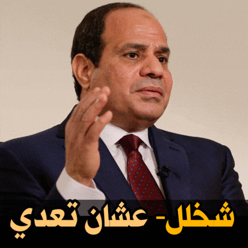 a man in a suit and tie is speaking in a foreign language