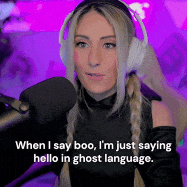 a woman wearing headphones says " when i say boo i 'm just saying hello in ghost language . "