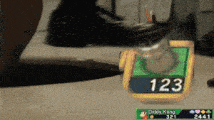 a video game screen shows diddy kong as the player number 123
