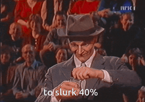 a man in a suit is standing in front of a crowd with the words to slurk 40 % above him