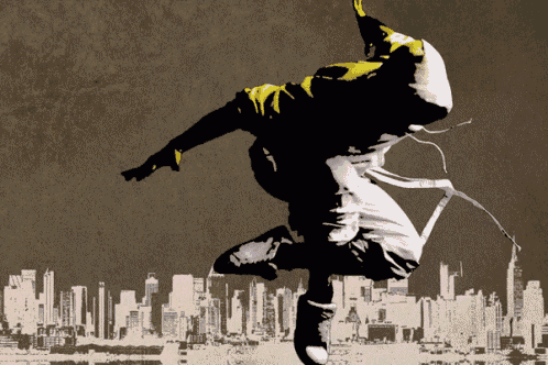 a person is jumping in the air with a city skyline behind them
