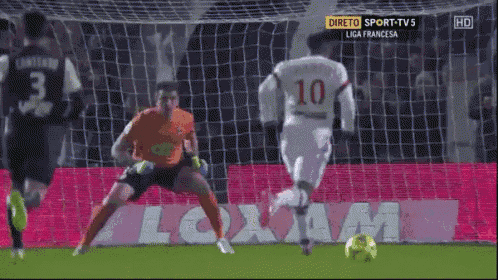 a soccer player with the number 10 on his jersey is running towards the goal