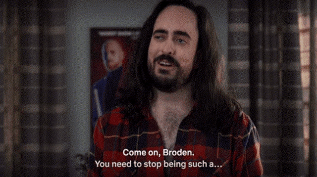 a man with long hair and a beard is saying come on , broden .