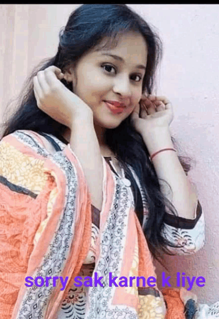 a girl is holding her ear and the words sorry sak karne k liye are on the bottom