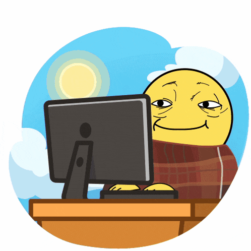 a cartoon smiley face is sitting in front of a computer monitor