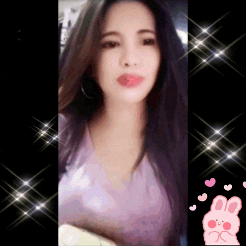 a woman in a purple shirt is surrounded by hearts and stars
