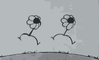 a black and white drawing of two flowers growing out of the ground .