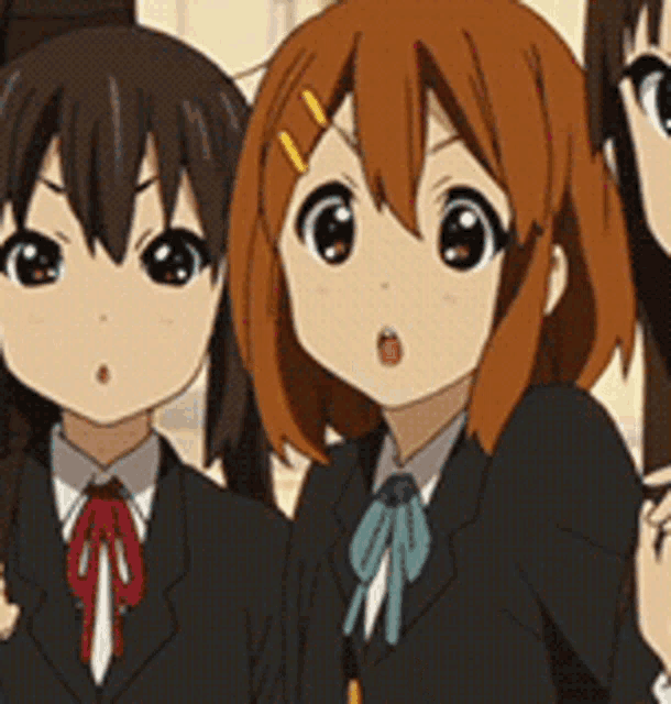three anime girls are standing next to each other and one has a surprised look on her face