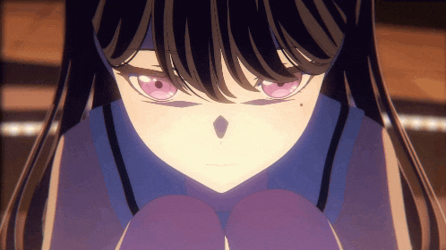 a close up of a girl with purple eyes