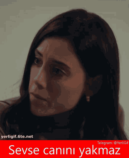 a picture of a woman with a caption that says sevse canni yakmaz
