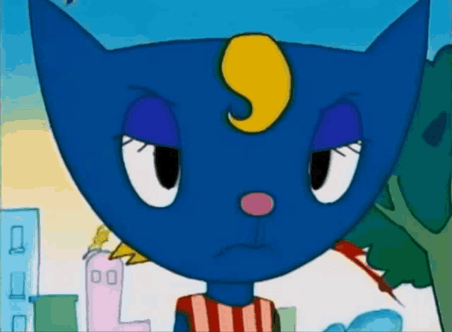 a blue cat with a yellow s on its head looks angry