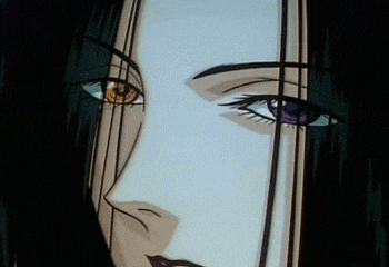 a close up of a cartoon character 's face with purple eyes