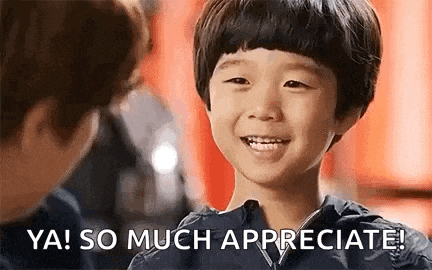 a young boy is smiling and saying `` ya ! so much appreciate ! ``