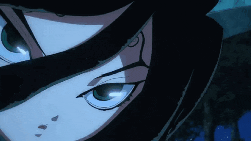 a close up of a girl 's face with a hood on