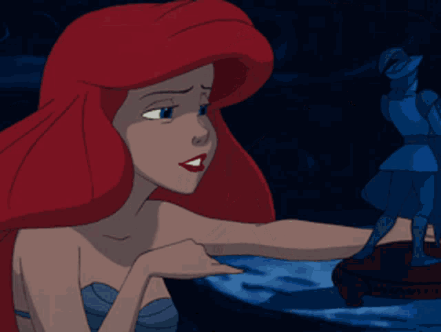 a cartoon of a woman with red hair and a fish