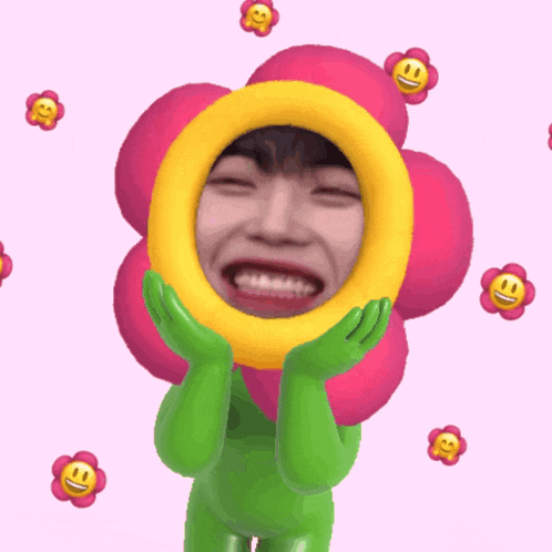 a person in a flower costume with smiley faces around