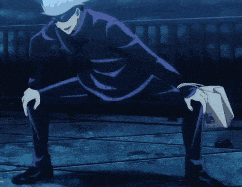 a man with white hair is squatting down while holding a book and a briefcase .