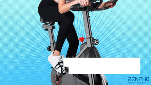 a woman is riding an exercise bike with a renpho logo in the corner