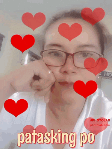 a woman wearing glasses is surrounded by red hearts and the words patasking po
