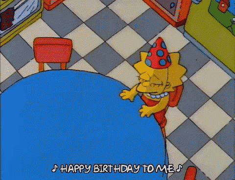a cartoon character wearing a party hat is sitting at a table and says happy birthday to me .