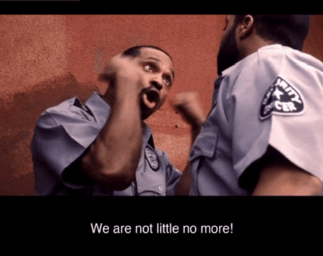 a security guard says we are not little no more while another guard looks on