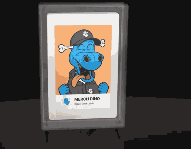 a picture of a blue dinosaur wearing a black hat and a black hoodie called merch dino