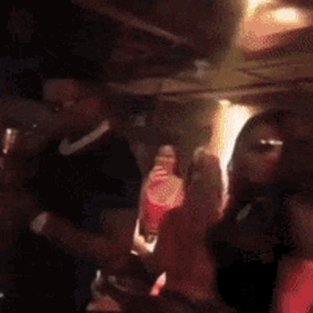 a man and a woman are dancing in a club
