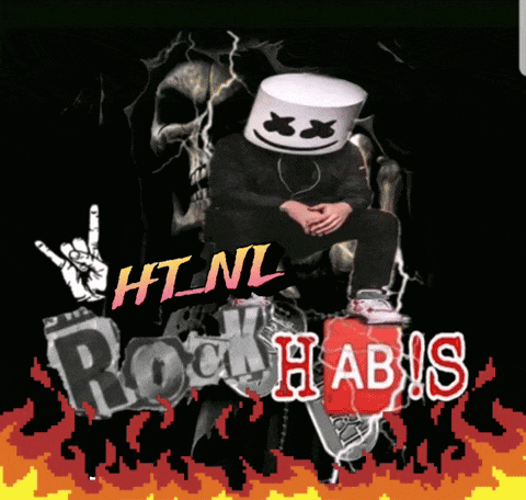 a man with a marshmallow on his head sits in front of a sign that says rock habis