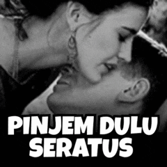 a black and white photo of a man and a woman kissing with the caption pinjem dulu seratus