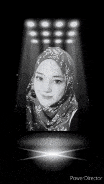 a black and white photo of a woman wearing a hijab with the words power director below her