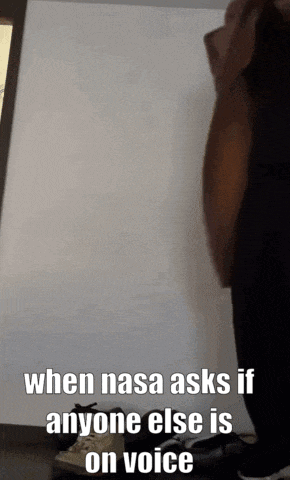 when nasa asks if anyone else is on voice someone is standing in front of a white wall