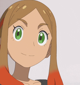 a close up of a cartoon character 's face with green eyes