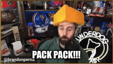 a man wearing a yellow hat with the words pack pack written on it