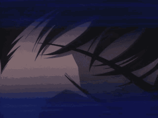 a close up of a person 's eye in a dark room