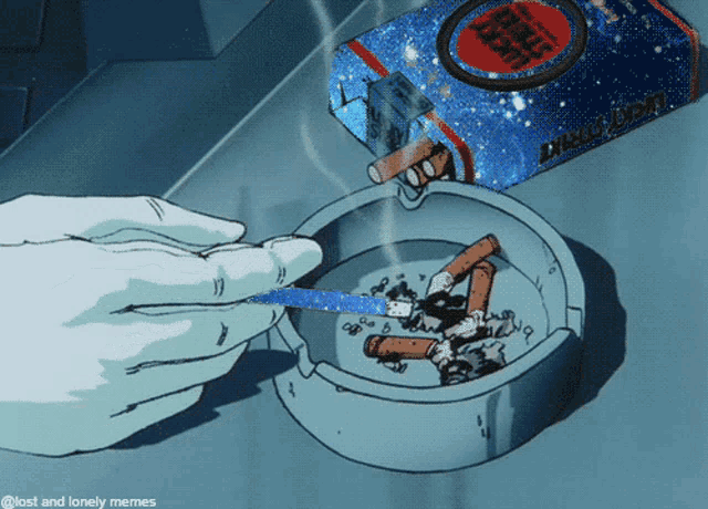 a person lighting a cigarette in an ashtray next to a box of lucky strike cigarettes