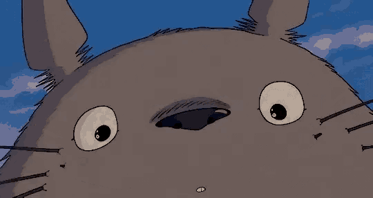 a close up of a cartoon character 's face with a large smile