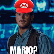 a man wearing a mario hat with the words mario written on it