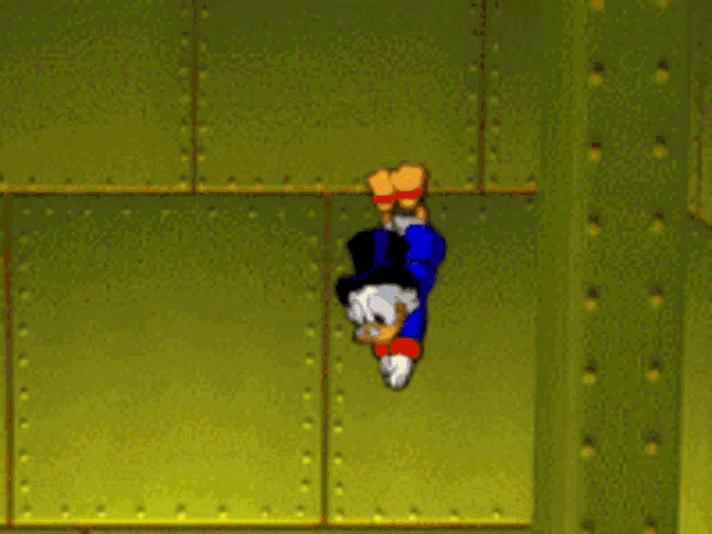 a cartoon character is hanging upside down on a yellow wall