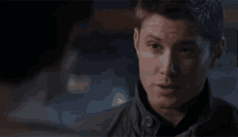 a blurry picture of a man 's face with the words bcl on the bottom right