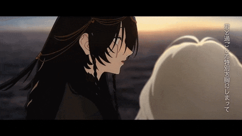 a woman with long black hair stands next to a man with white hair