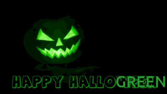 a green carved pumpkin with the words happy hallogreen written below it
