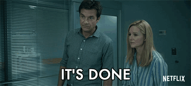 a man and woman standing next to each other with the words it 's done
