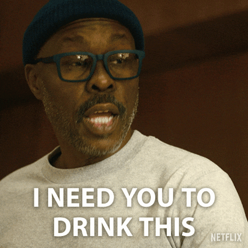 a man with glasses says i need you to drink this