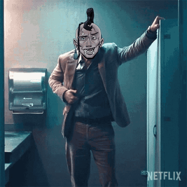 a man in a suit stands in front of a netflix logo