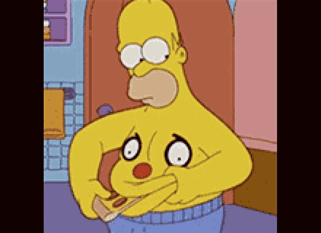 homer simpson from the simpsons is holding a hot dog in his hand