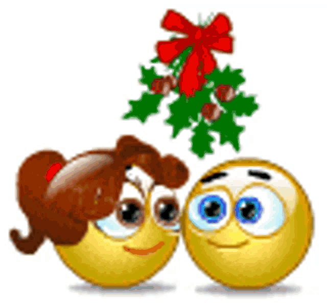 two smiley faces kissing under a mistletoe .
