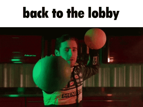 a man in a boxing glove is holding a basketball and the words back to the lobby are above him