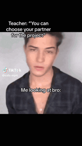 a man in a plaid shirt is talking about a project