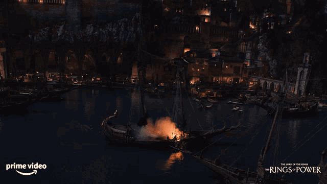 a poster for the lord of the rings shows a boat on fire