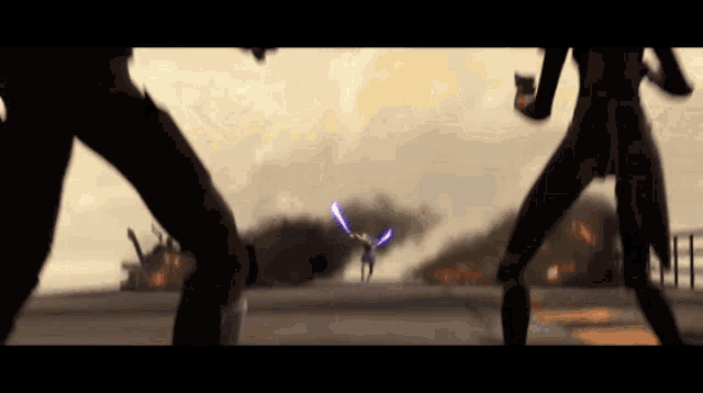 two people are fighting with lightsabers in a video game .